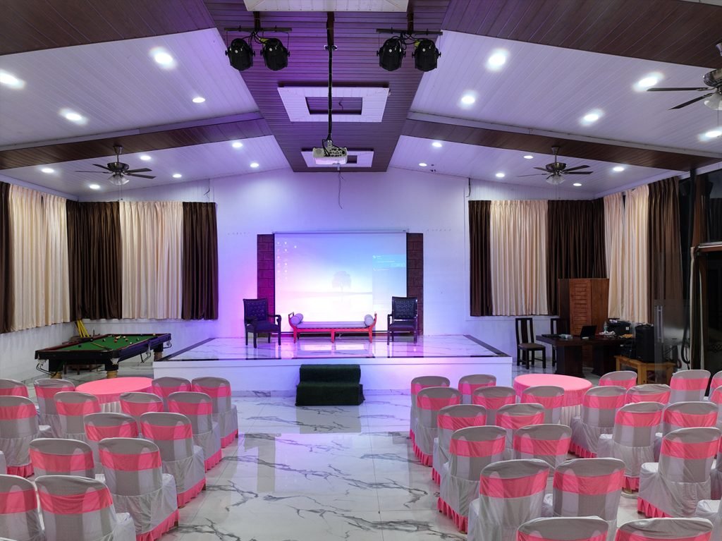 Elegantly decorated wedding hall with floral arrangements