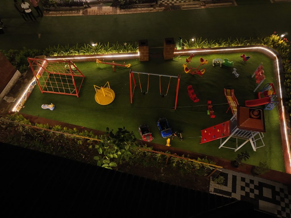 Bird's-eye view of Prathamesh Valley Resort with scenic landscapes.