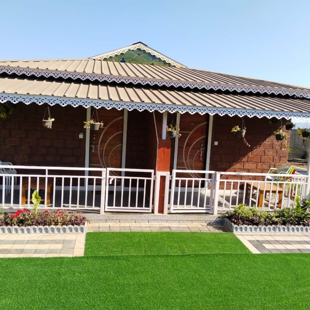 Traditional Natural Lal Chira (Kokani) Cottage surrounded by nature.