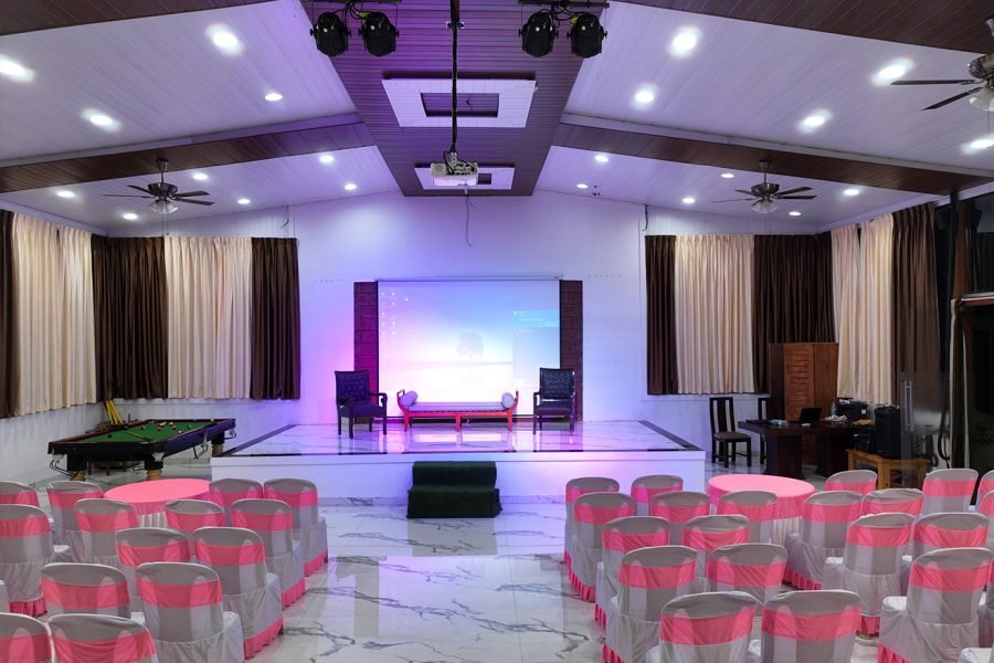 Elegantly decorated wedding hall with floral arrangements